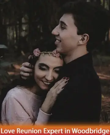 In a serene woodland embrace, a couple finds solace in each other's presence, their hearts united in a tender moment of peace and understanding. The gentle caress of nature mirrors their deep connection and harmony. Love reunion expert in Woodbridge.