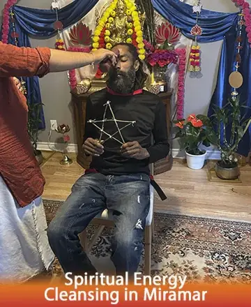 In a serene space adorned with vibrant flowers and glowing candles, a peaceful ritual unfolds. A gentle touch brings harmony and balance, inviting tranquility into the heart. This sacred moment provides a sanctuary for the soul. Spiritual energy cleansing in Miramar.