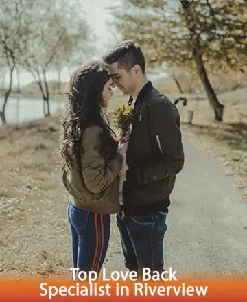 In a serene embrace beneath the gentle rustle of autumn leaves, a couple finds solace and connection, their hearts entwined in a tender moment of understanding. This peaceful scene embodies the warmth of rekindled love and the gentle whispers of hope. Love restoration in Riverview.
