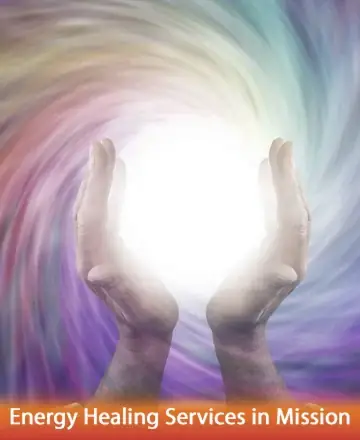 In the serene embrace of gentle hands, a radiant light glows warmly, enveloped by swirling colors that dance in harmony. This image evokes a sense of peace and renewal, inviting you to find tranquility in every moment. Energy healing in Mission.