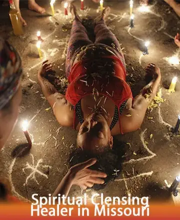 In a serene circle of flickering candles, a gentle presence lies in peaceful contemplation, enveloped in the soft embrace of healing energies. The atmosphere whispers tranquility and renewal, inviting the soul to awaken and find solace. Spiritual cleansing healer in Missouri.