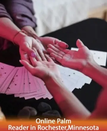 In a serene setting, gentle hands connect over a spread of cards, creating a moment of shared wisdom and calm. The warm glow envelops the scene, inviting trust and reflection. Discover peace and guidance through the art of palm reading. Online palm reader in Rochester, Minnesota.