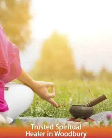 In the gentle embrace of a sunlit meadow, a serene figure meditates beside a softly smoking incense bowl, inviting tranquility and reflection. The soothing ambiance fosters a deep connection to inner peace and wisdom. Spiritual healing in Woodbury.