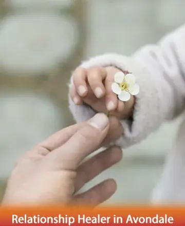 In the gentle exchange of a delicate blossom between hands, we find a poignant symbol of connection and trust. This tender gesture radiates warmth and the promise of healing, offering a sanctuary of peace and understanding. Relationship healer in Avondale.