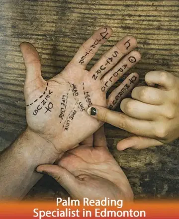 In a serene moment of connection, gentle hands trace the lines of destiny etched upon a palm. This sacred touch whispers secrets of the heart, offering clarity and comfort to the soul. Trust in this ancient wisdom. Palm reading specialist in Edmonton.