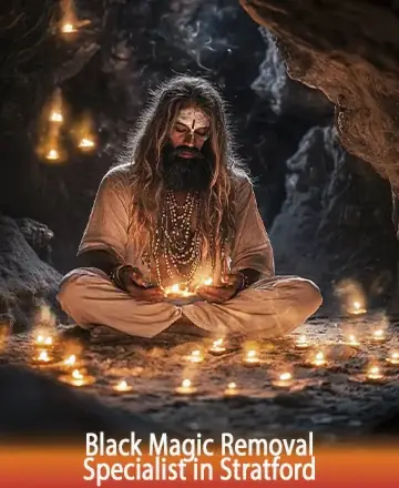 In a serene cave illuminated by the gentle glow of countless candles, a wise figure sits in quiet contemplation, radiating a deep sense of peace and spiritual wisdom. The atmosphere is filled with warmth and gentle energy, inviting healing and tranquility. Black magic removal in Stratford.