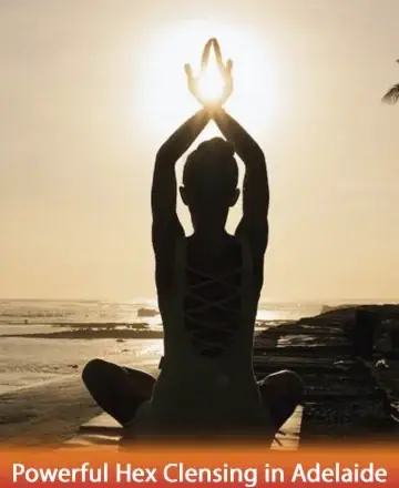 In the serene embrace of twilight, a silhouette meditates against the gentle waves, capturing the essence of tranquility and inner peace. The setting sun cradles the spirit, inviting a moment of deep reflection and harmony. Powerful hex cleansing in Adelaide.